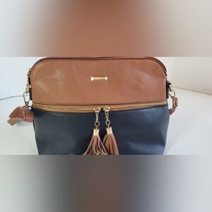 Chic Two-Tone Crossbody Bag with Tassels